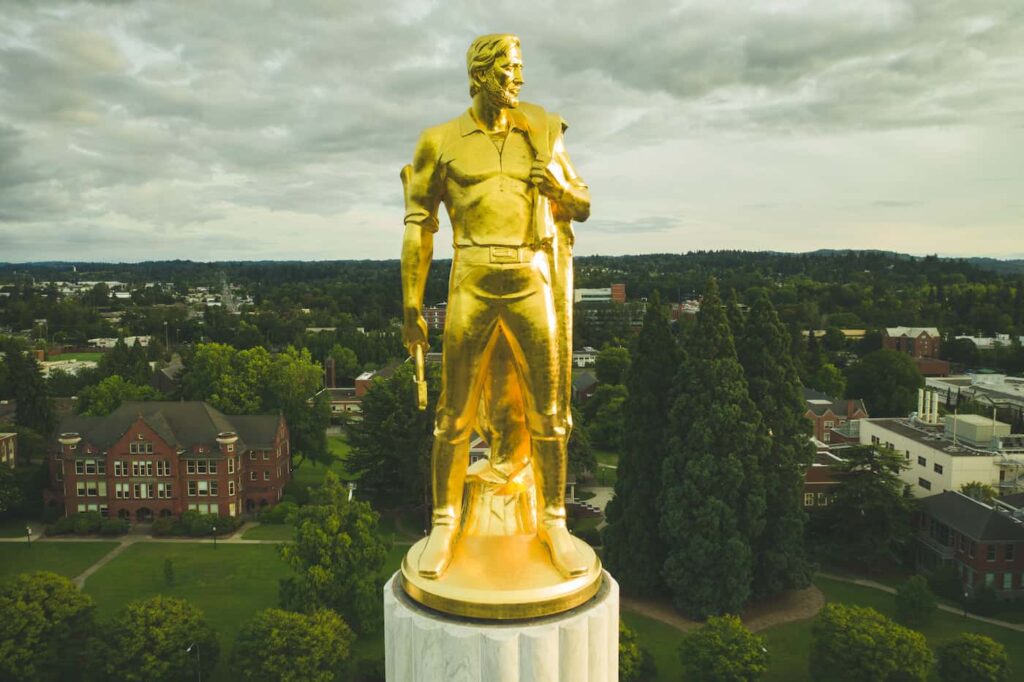 The gold pioneer statue that sits on top of the Oregon capitol dome where the senate recently passed SB 292A