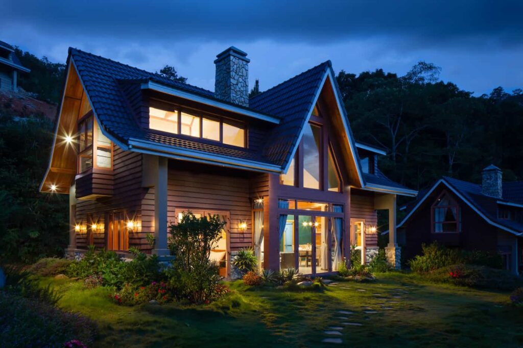 A well-lit home at dusk with stunning curb appeal