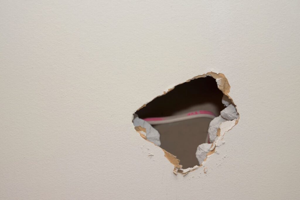 A hole in a wall property damage