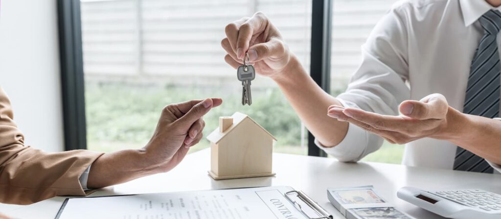 a bad landlord handing the keys to a rental over to his new tenants